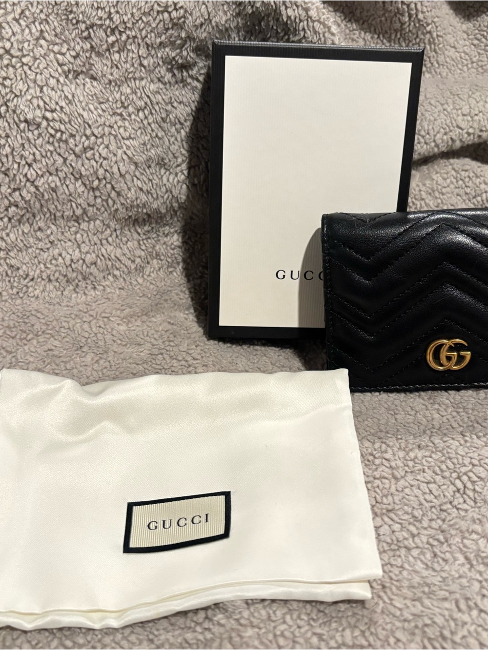 Gucci Black Quilted Leather Bi-Fold Wallet with Gold GG
